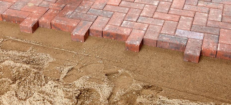 Wanneer gebruik je welk zand voor bestrating?