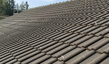 Oude_betonnen_dakpannen_dakrenovatie_denekamp